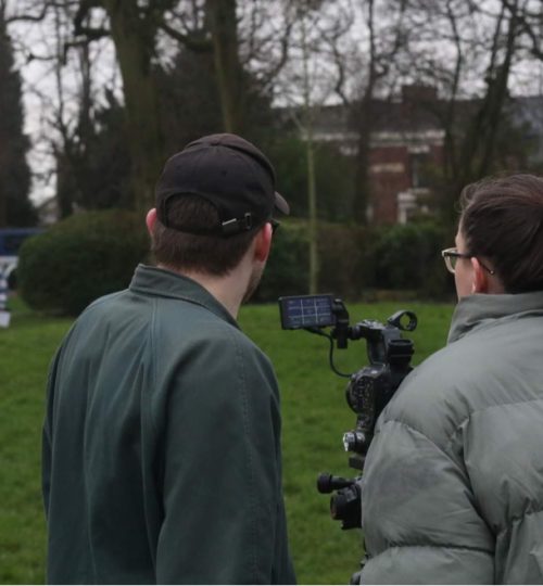 BTS scene of Director Elise and D.O.P Callum discussing the shot